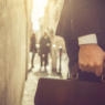 Business person walking with briefcase