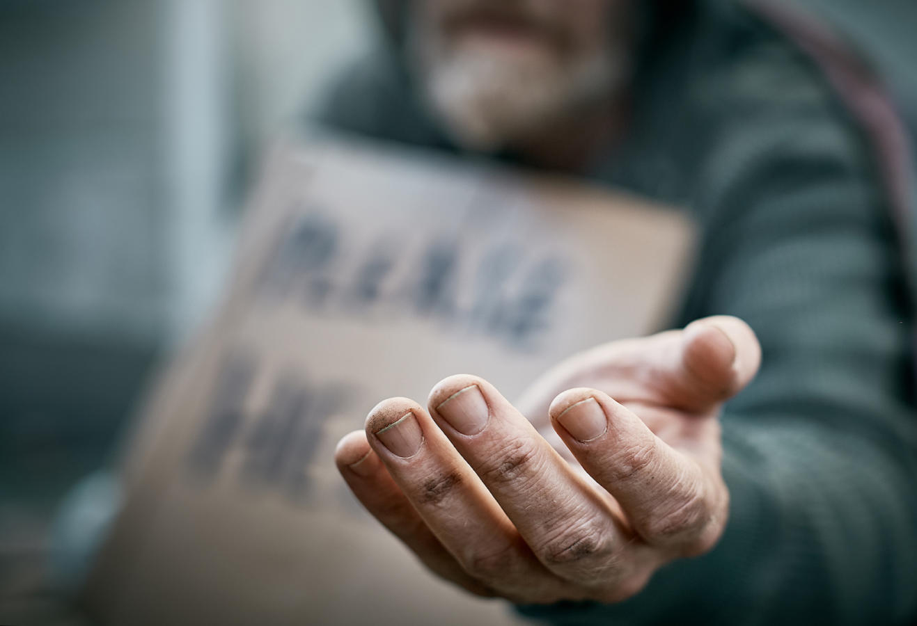 Outstretched hand of beggar