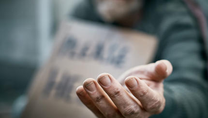 Outstretched hand of beggar