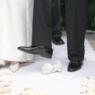 groom stomping on a glass at a jewish wedding