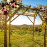 photo of a Jewish wedding canopy outdoors at sunset