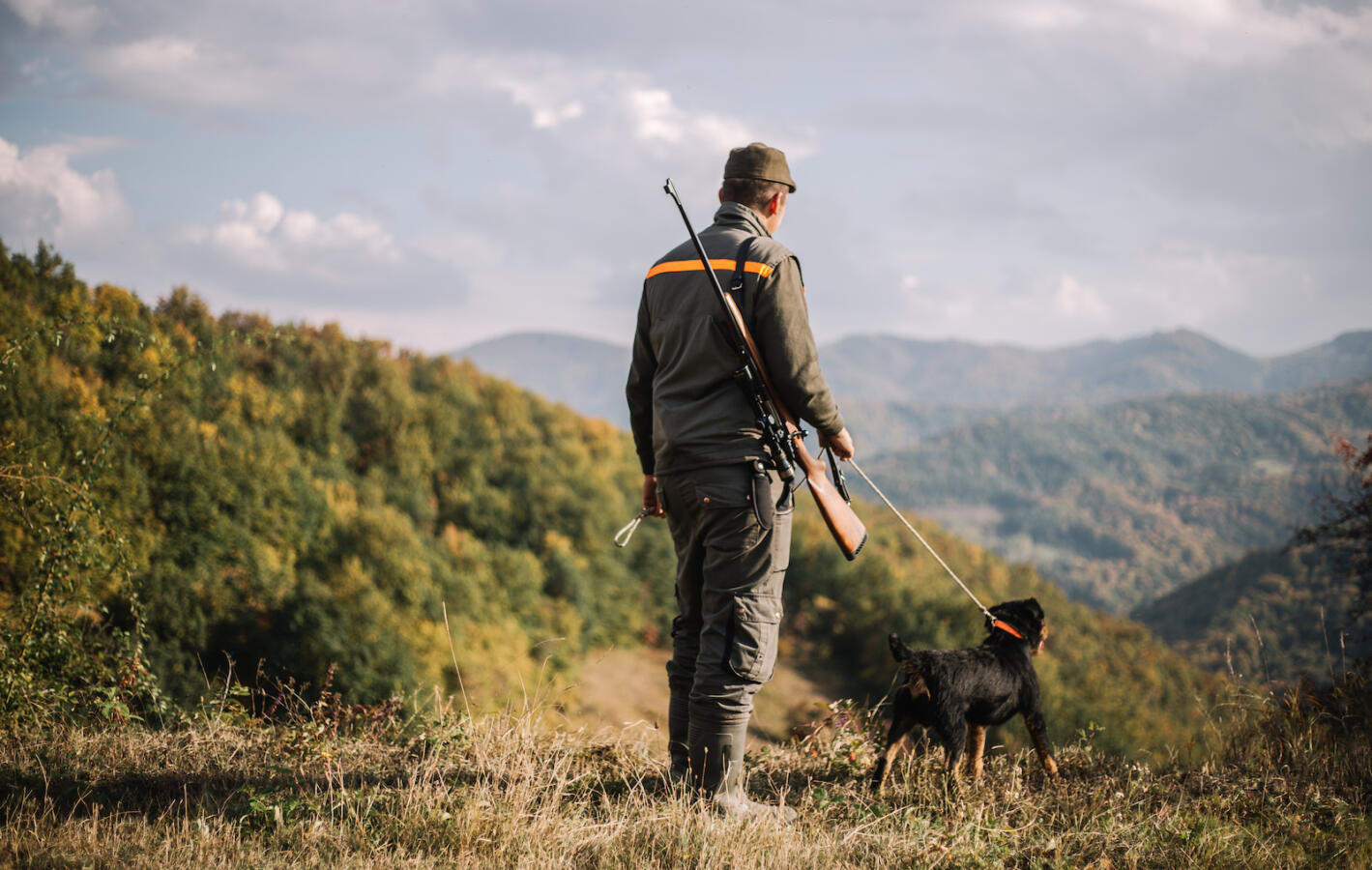 Hunter with hunting dog during a hunt