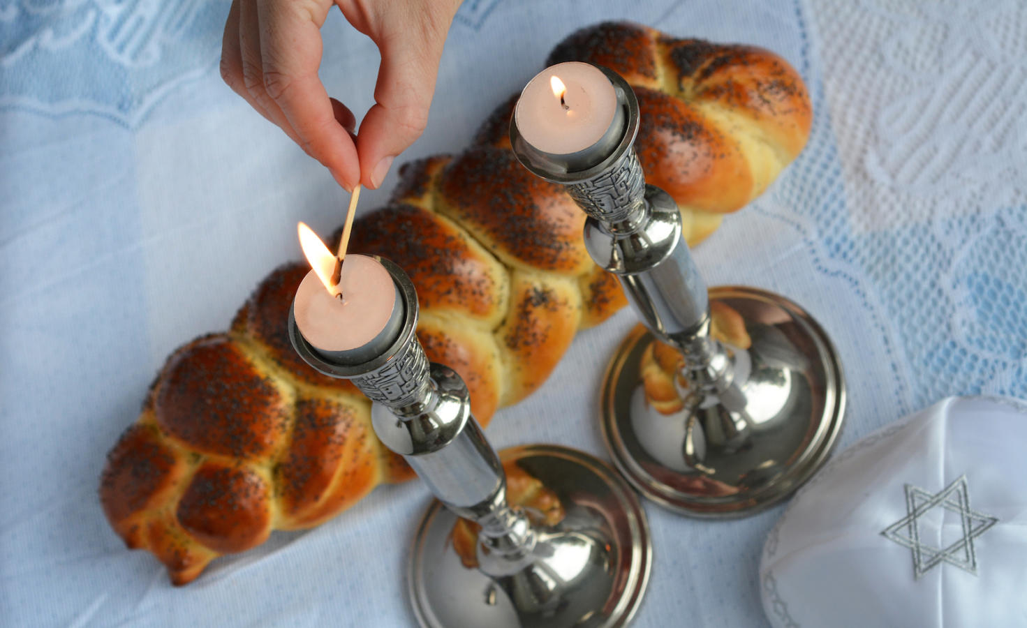 lighting shabbat candles