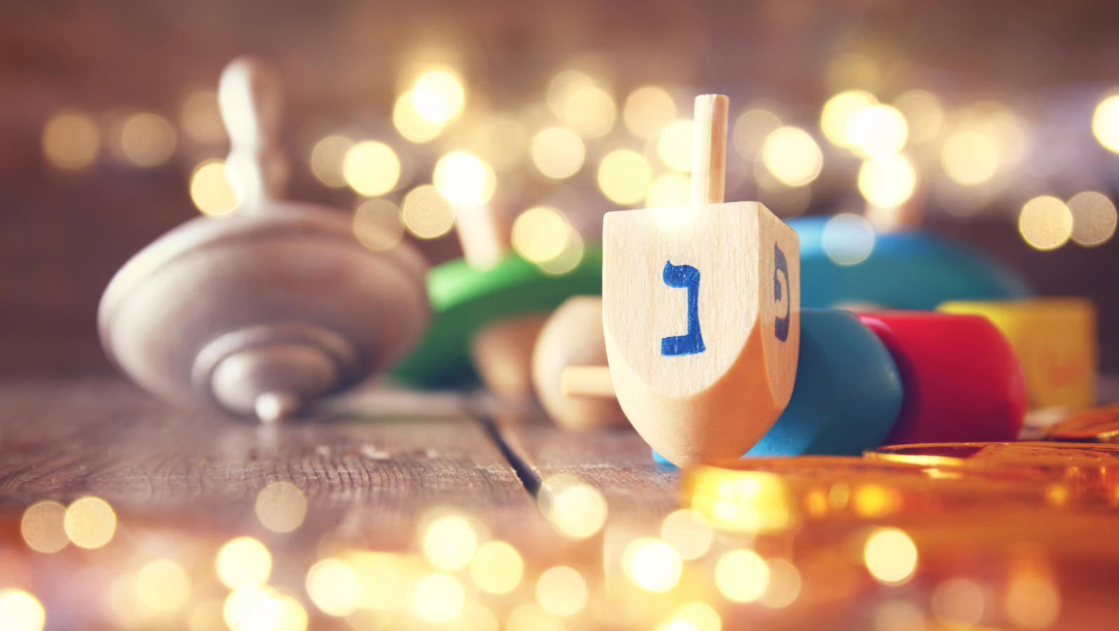 Image of jewish holiday Hanukkah with wooden dreidels