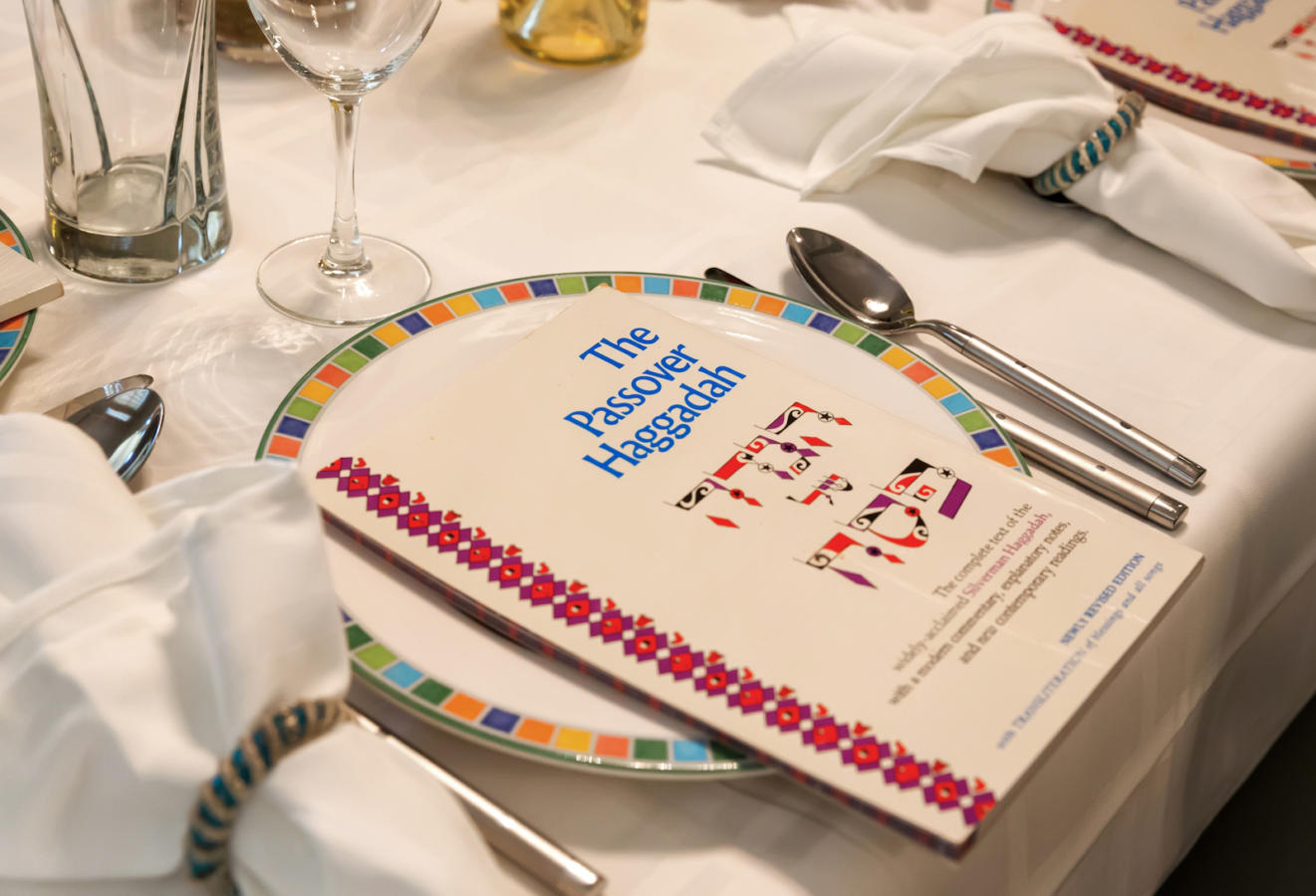 Traditional Passover Seder Table with Haggadah