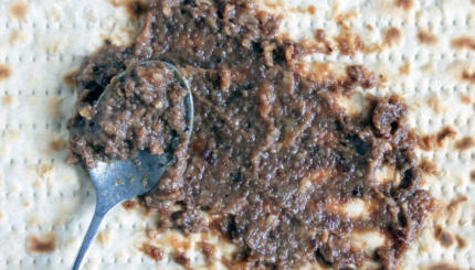 Date and walnut spread (Charoset) over a Matzo bread