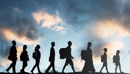 Refugees People With Luggage Walking In A Row