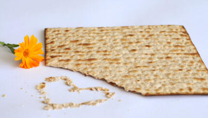 matzah, flower, crumbs in the shape of a heart