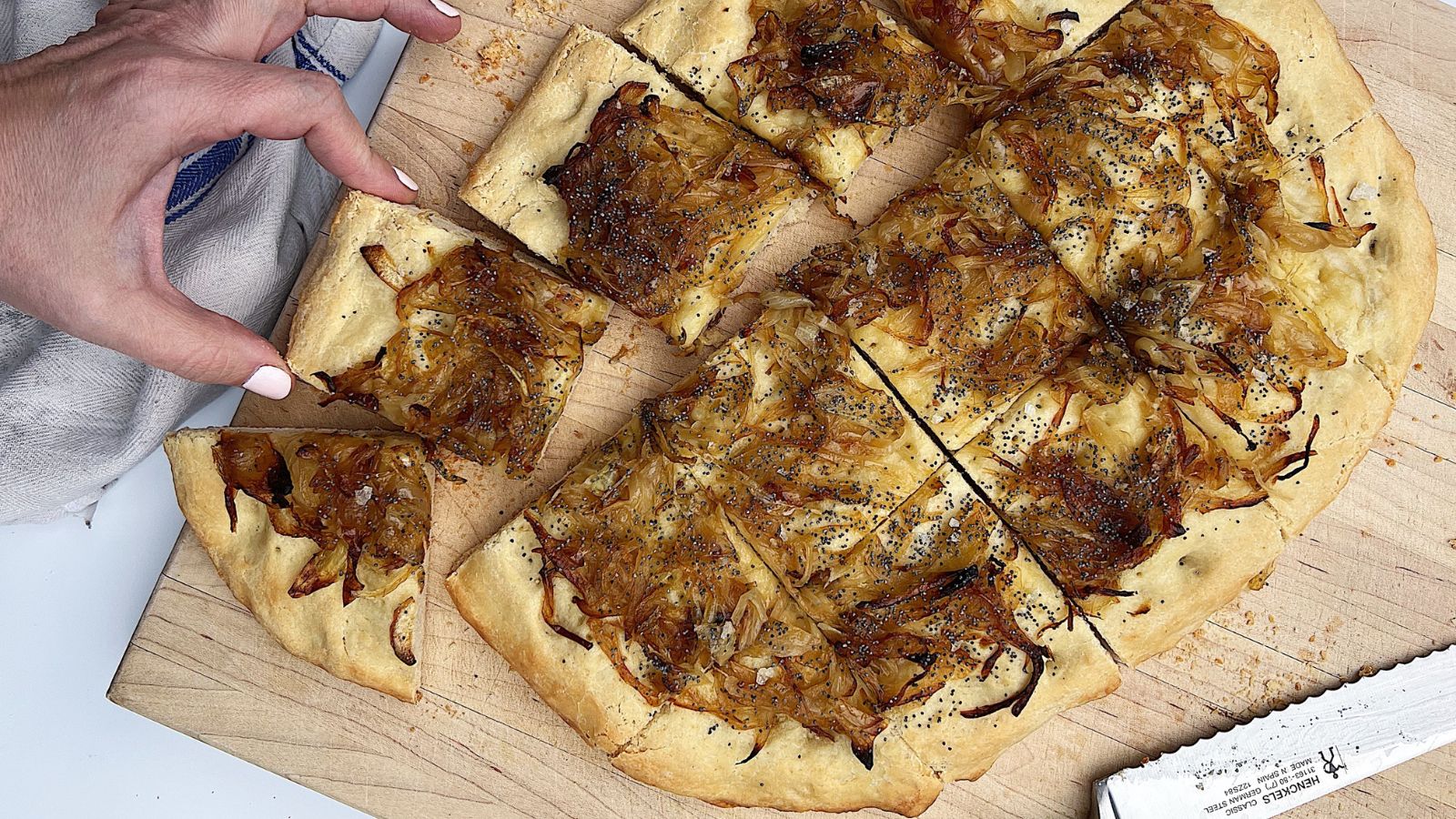 https://www.myjewishlearning.com/wp-content/uploads/2023/03/pretzel-onion-flatbread.jpg