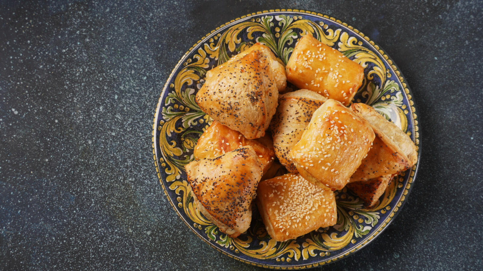 Burekas with cheese and mushrooms, potato. Israeli Savory Pastries.