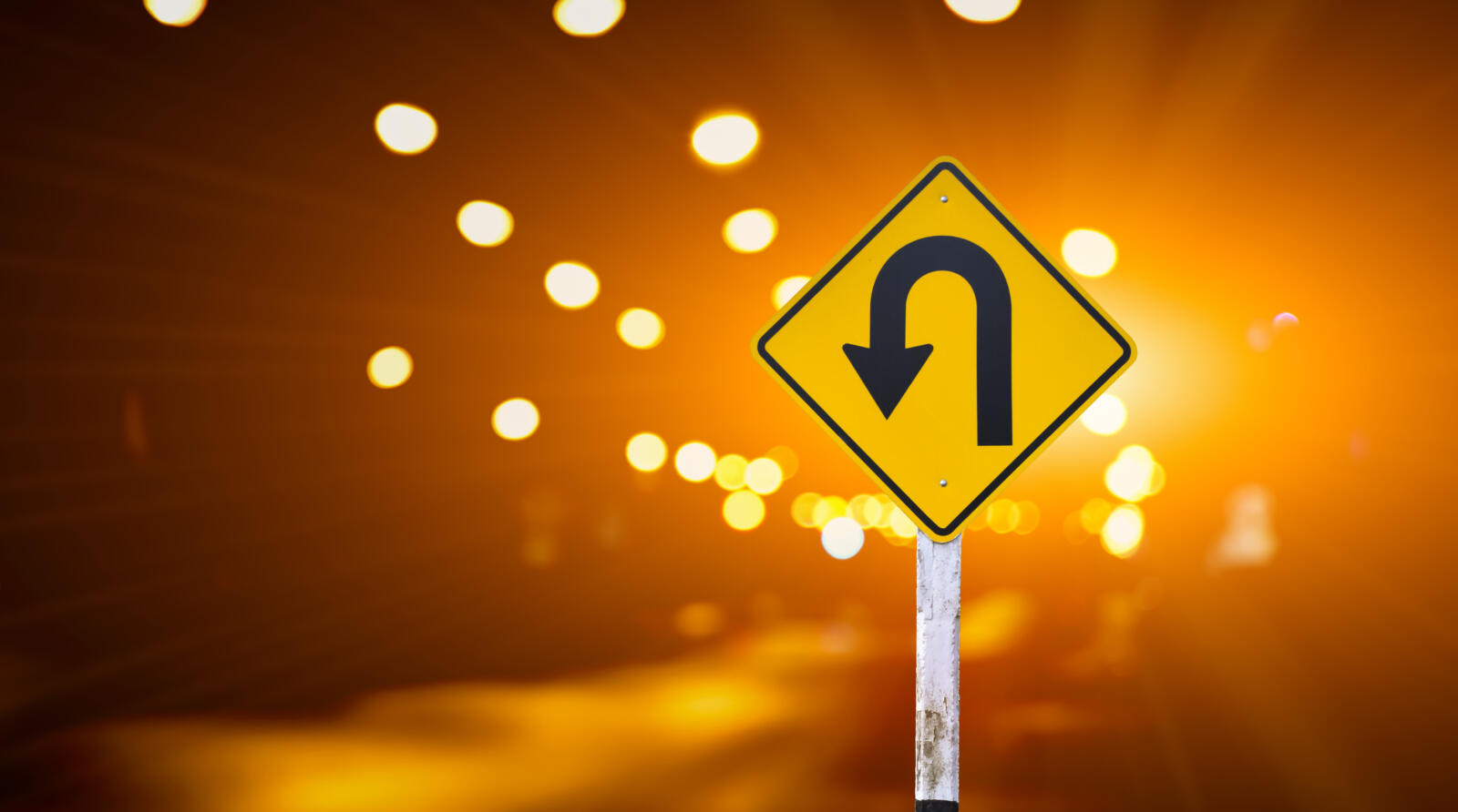 photograph of a u-turn sign